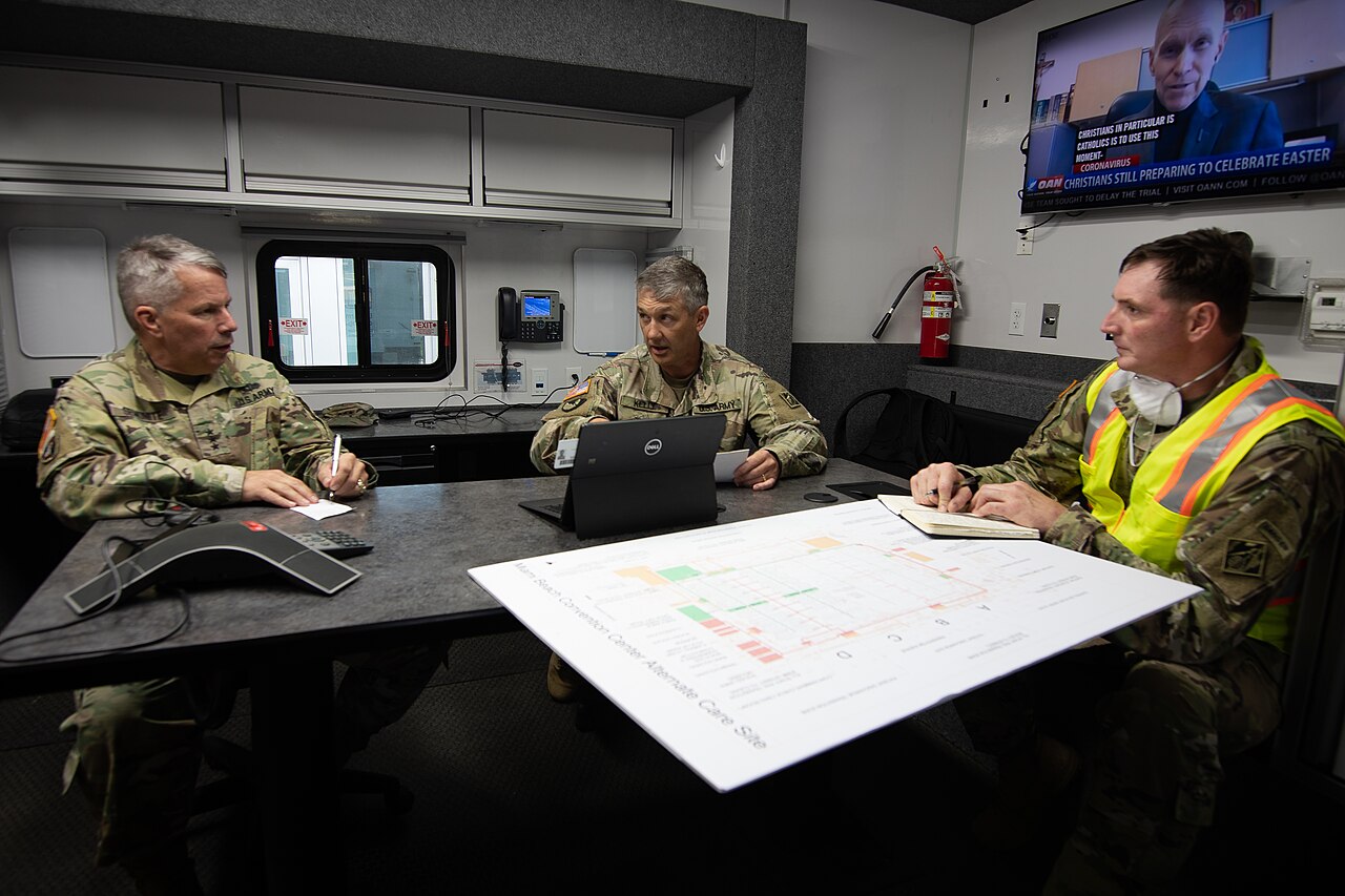A modern medical office building with glass façade in the Brickell district, Miami skyline in background